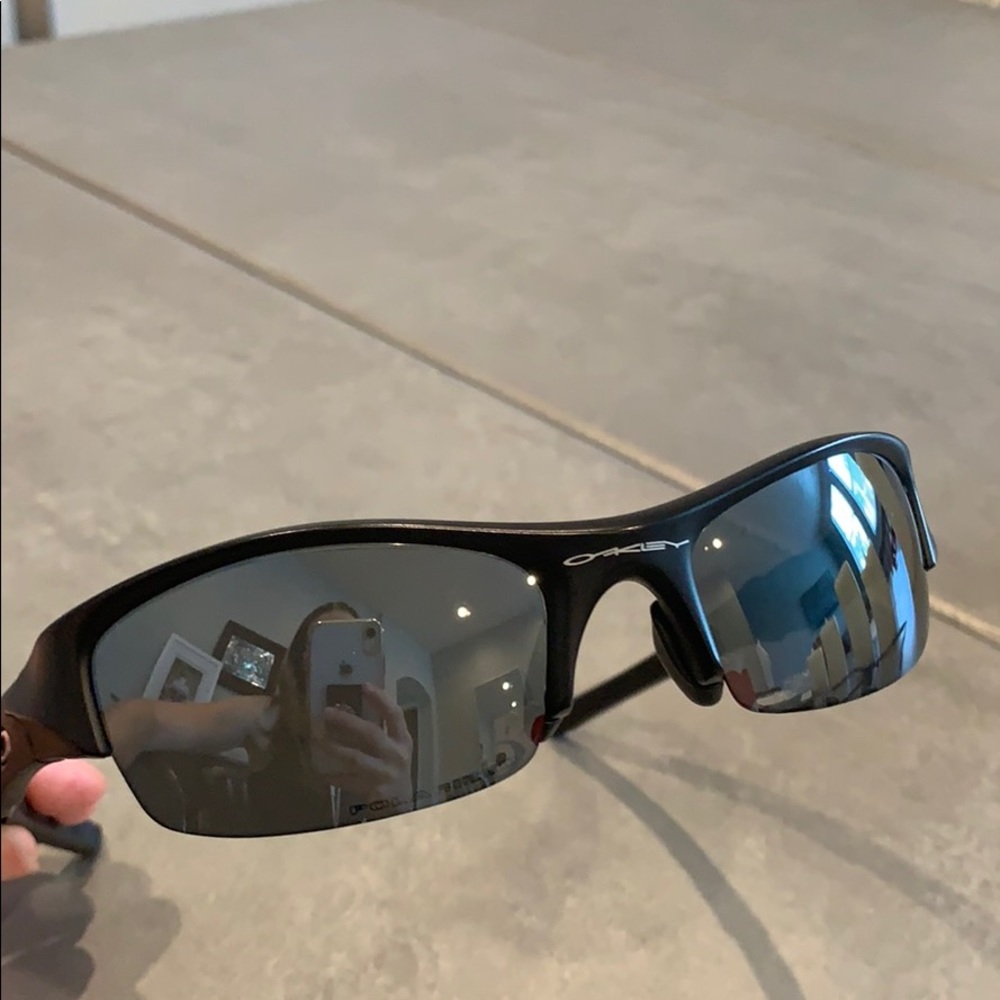 Black plastic and rubber Oakley sunglasses.